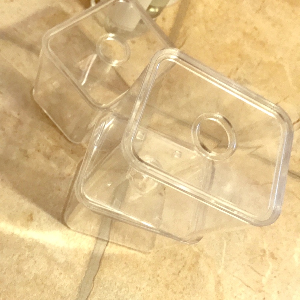 Makeup storage containers for vanity table.